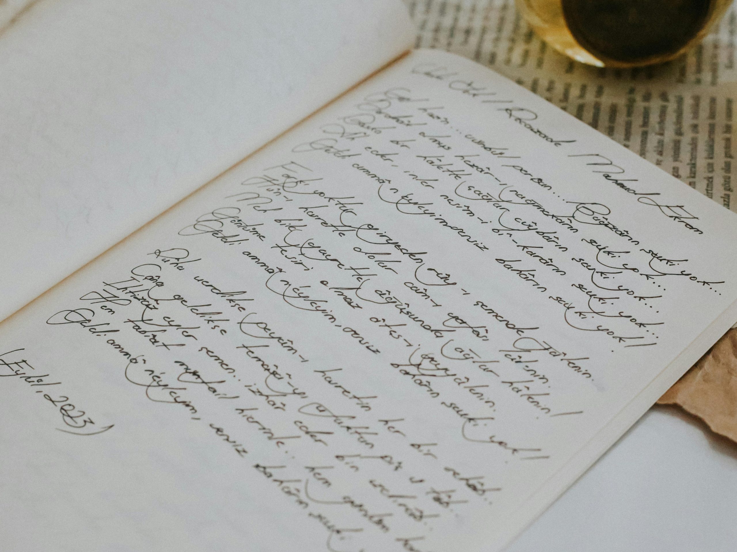 Quill dipping ink,Paintbrush stroke,Open book margin notes