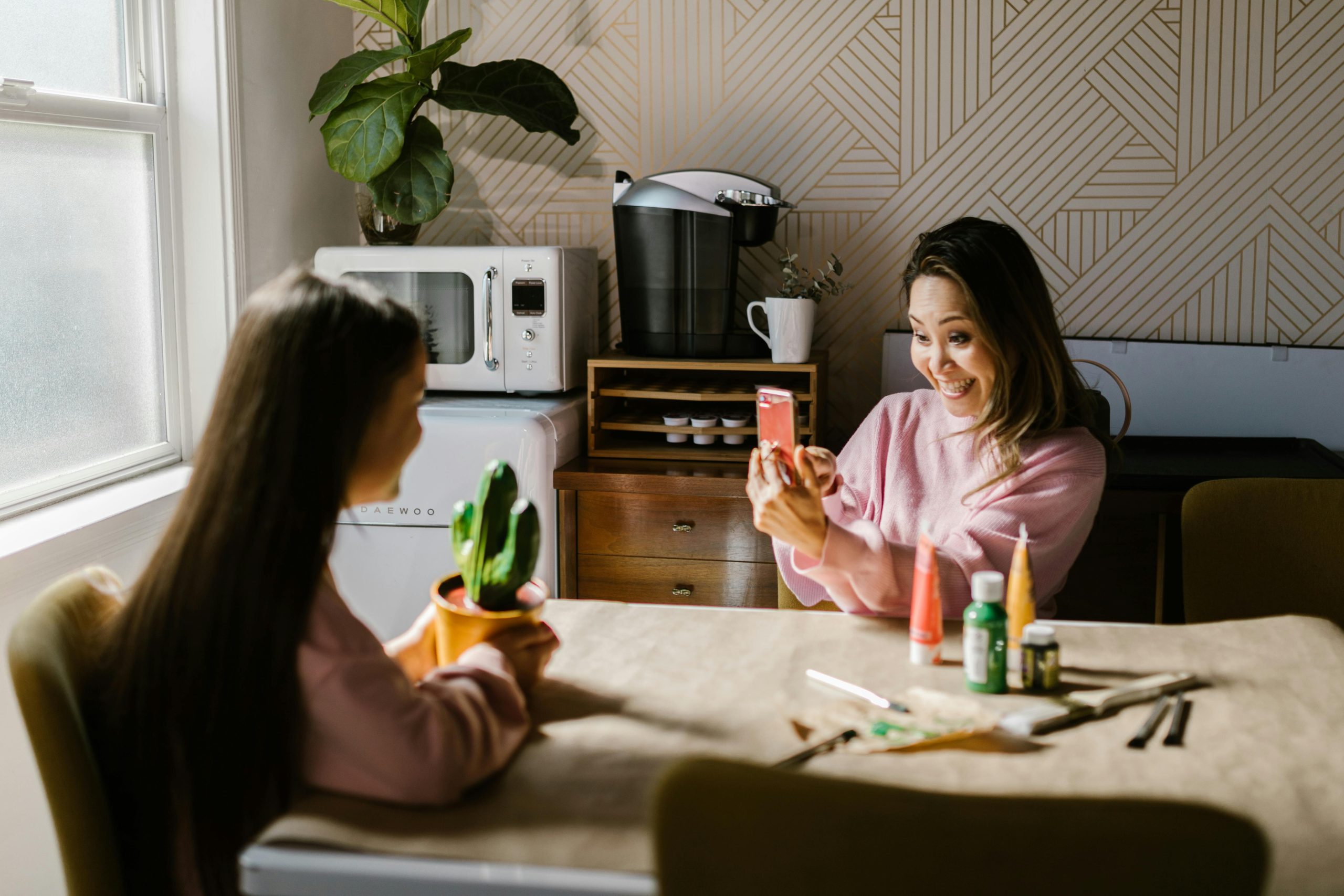 paint brushes,spilled paint,dancing in kitchen light